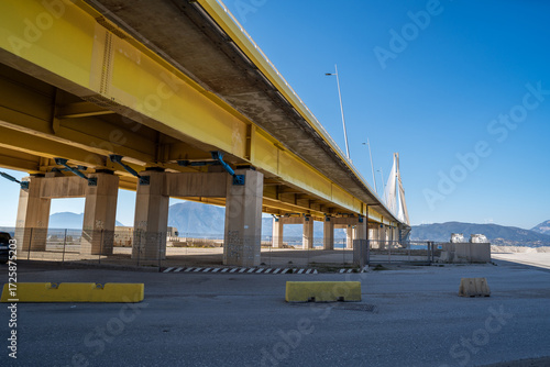 View from below of the Rio Antirio Bridge showing the shock absorbers that protect the bridge from falling during an earthquake.