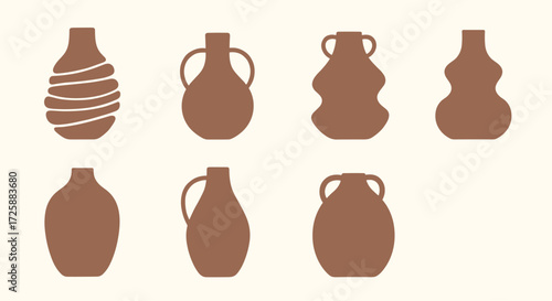 An assortment of handcrafted ceramic vases with varied shapes and designs.