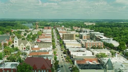 Wallpaper Mural Aerial view captures downtown lawrence, kansas, with its buildings and green trees Torontodigital.ca