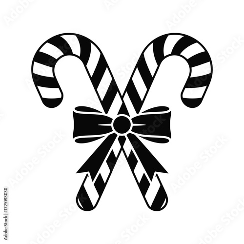 Two crossed candy canes tied with a bow