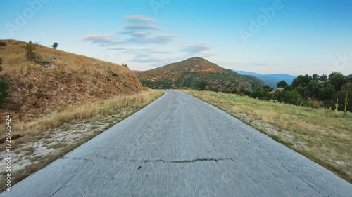 POV driver perspective, driving on narrow road in the mountain, height