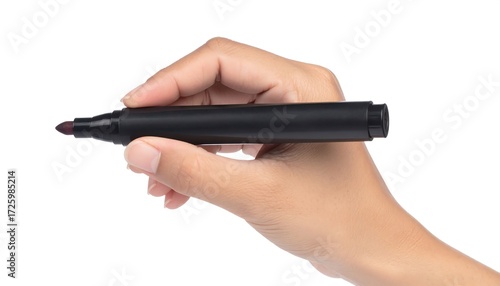Hand holding a black marker