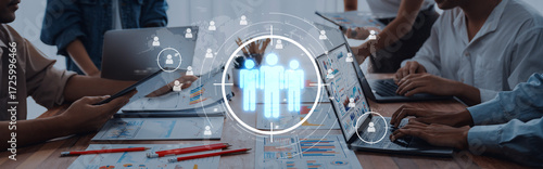 Quadro su tela A team collaborates in a modern digital workspace, utilizing technology and visual data to enhance project management and foster effective communication for better outcomes