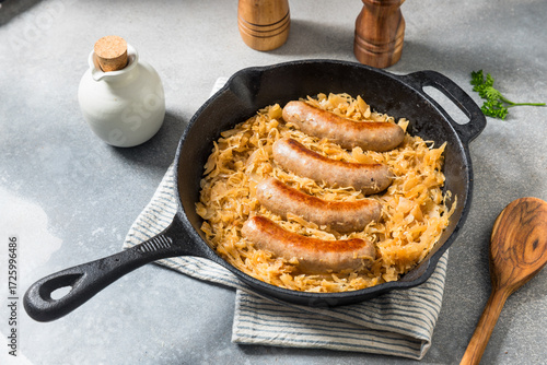 Fototapeta Naklejka Na Ścianę i Meble -  Homemade Savory Bratwurst and Sauerkraut
