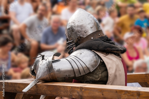 Fotografie Medieval knight resting in armor at a jousting tournament