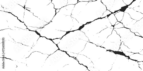 Dried, cracked concrete wall texture shows an abstract pattern of aging, brittle surface and earth-like cracks