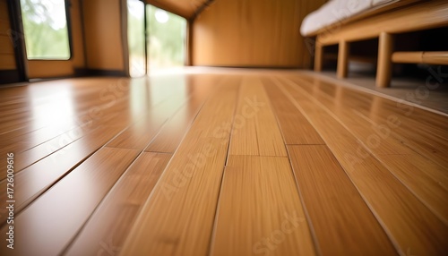 Wooden floor in a modern interior with natural light and a minimalist design.