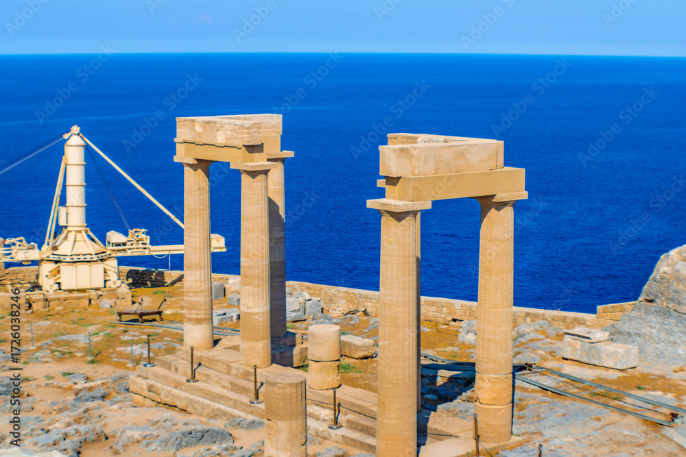 Naklejka premium The Acropolis of Lindos. the ruins of an ancient citadel on a steep cliff with sea views, Rhodes, Greece