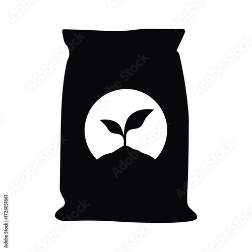 Black bag of fertilizer compost soil with plant sprout growing for agriculture and gardening use