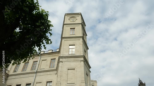 Clock Tower of Great Gatchina Palace with chiming clock in suburb of St. Petersburg, Russia