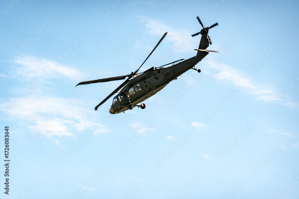 Fototapeta premium Military helicopter UH-60 in flight