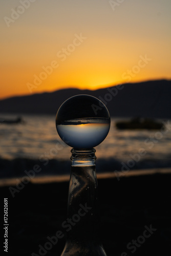 Crystal Ball on a Bottle Sunset at Sea, Lensball on Sand and Sunset