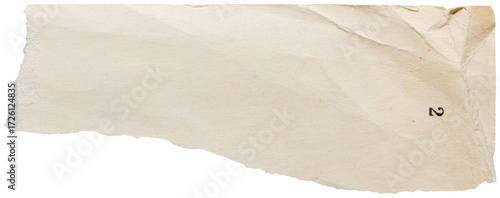 Torn strip of old worn paper with wrinkled corner isolated for collage and scrapbooking
