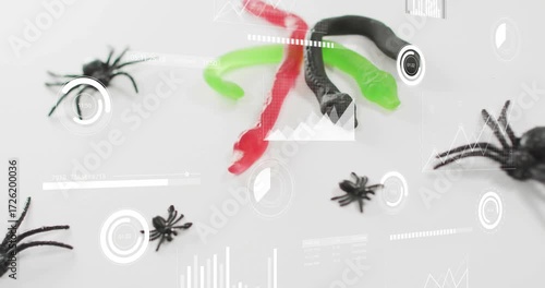 On start overlays sliding and rotating over rubber snake, gummy worms and spiders to visualize data