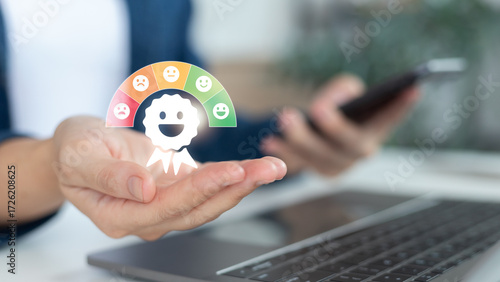 Hand holding customer satisfaction icon with feedback rating scale, service review, happy face, online survey, customer experience (CX), quality assurance, and business service improvement.