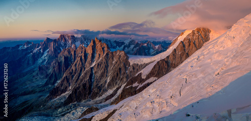 Mountain landscape of the Alps in Chamonix valley, France high resolution wide angle panoramic landscape. Alpine scenery in summer sunny weather on Tour du Mont Blanc, TMB trekking route