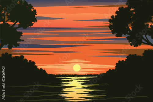 Vibrant sunset over calm water framed by silhouetted tree branches