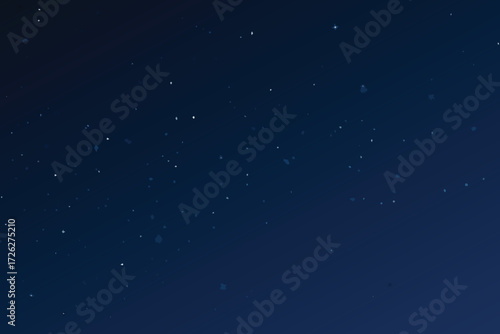 A dark blue night sky speckled with countless distant twinkling stars