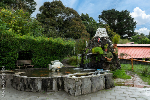 Detail of a stone fountain in an outdoor garden
