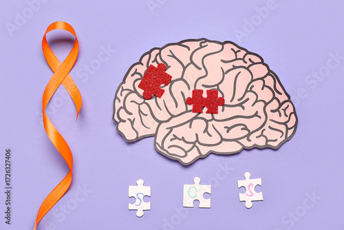 Paper brain with puzzle pie...
