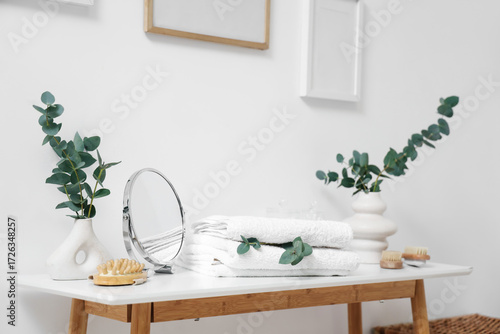 Vases with eucalyptus branc...