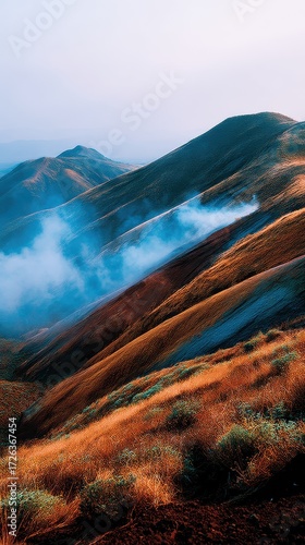 Misty Mountain Landscape Orange and Brown Hillsides, Blue Fog