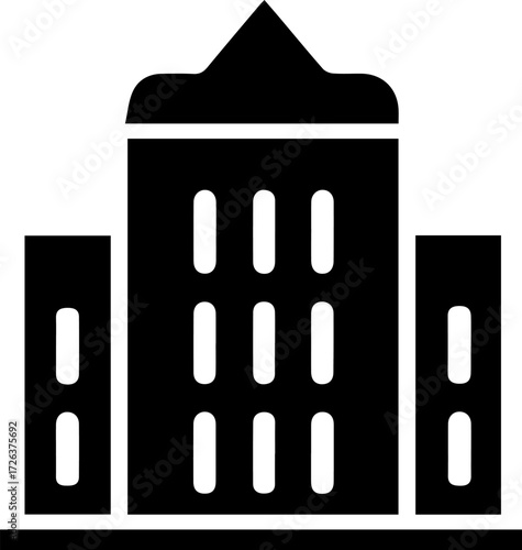 Large building with a roof and windows. The building is black and white