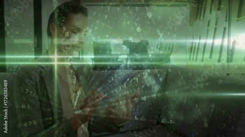 Wallpaper Mural Mid-adult woman tapping tablet analyzing data, sorting numbers under green scan line in technology Torontodigital.ca