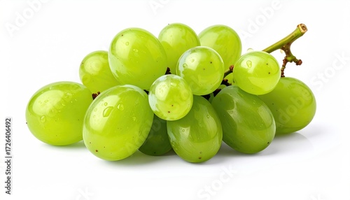 Fresh green grapes on a stem against a white background