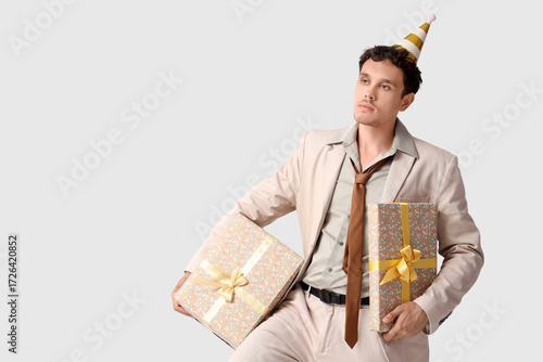 Young man with Birthday gif...