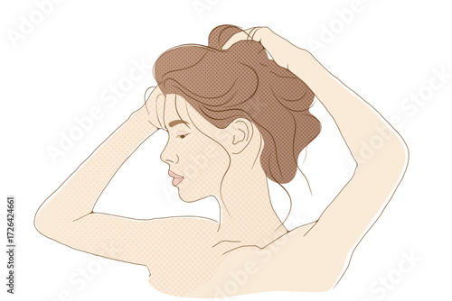 ふんわりと髪を束ねる女性