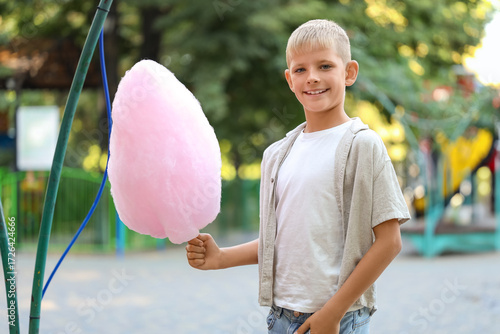 Teen boy with cotton candy ...
