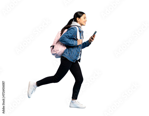 Side Profile of Trendy Teen Girl Walking with Phone and Backpack, Urban Street Style, isolated on transparent background PNG