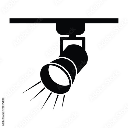 Black silhouette of a modern adjustable track light fixture with beams of light