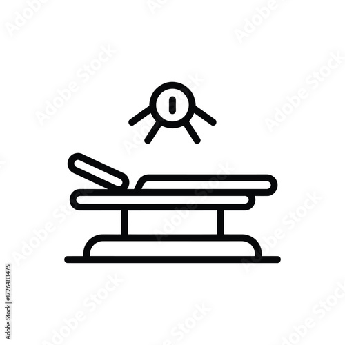 Modern medical examination table with adjustable headrest and overhead light icon