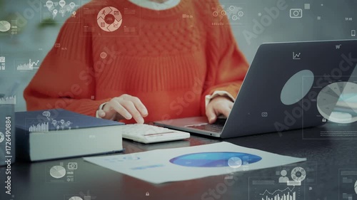 Woman using laptop and business data concept