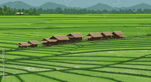 Idyllic rural village nestled amidst vibrant green rice paddies under a clear sky
