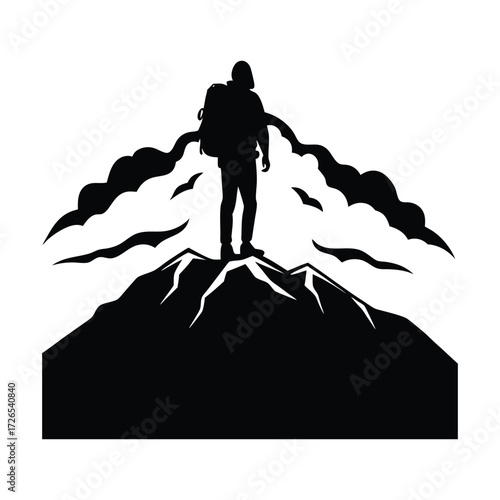 Hiker on mountain peak silhouette backpack