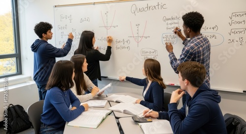 Students working at a whiteboard in a classroom setting.