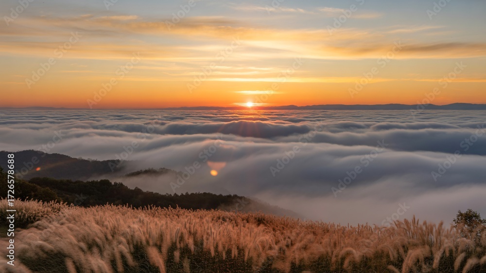 Fototapeta premium Breathtaking sunrise over clouds and mountains creating a dreamlike landscape with golden light shining through, perfect for travel and nature themes
