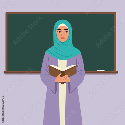 Female teacher wearing hijab reading book in classroom with blackboard