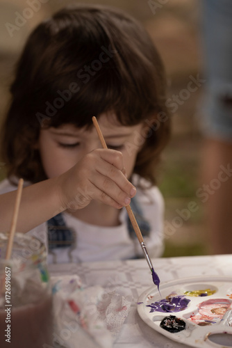 little girl painting