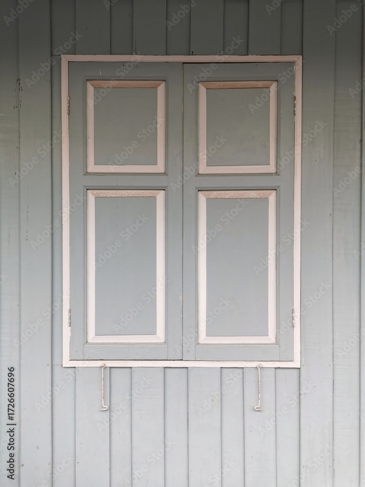 Fototapeta premium wooden door and window of wood house , pastel color , thailand