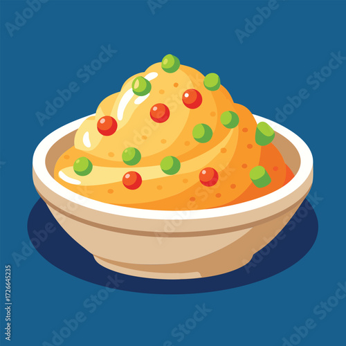 A bowl of mashed potatoes with peas and red pepper dots