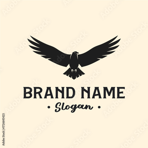 Eagle logo design with spread wings and brand name.