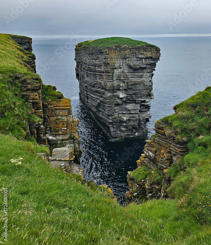Wonderful views of the cliffs with islands and birds in the Scottish Highlands near Thurso