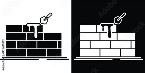 Black and white illustration of a brick wall being built with a trowel and mortar.