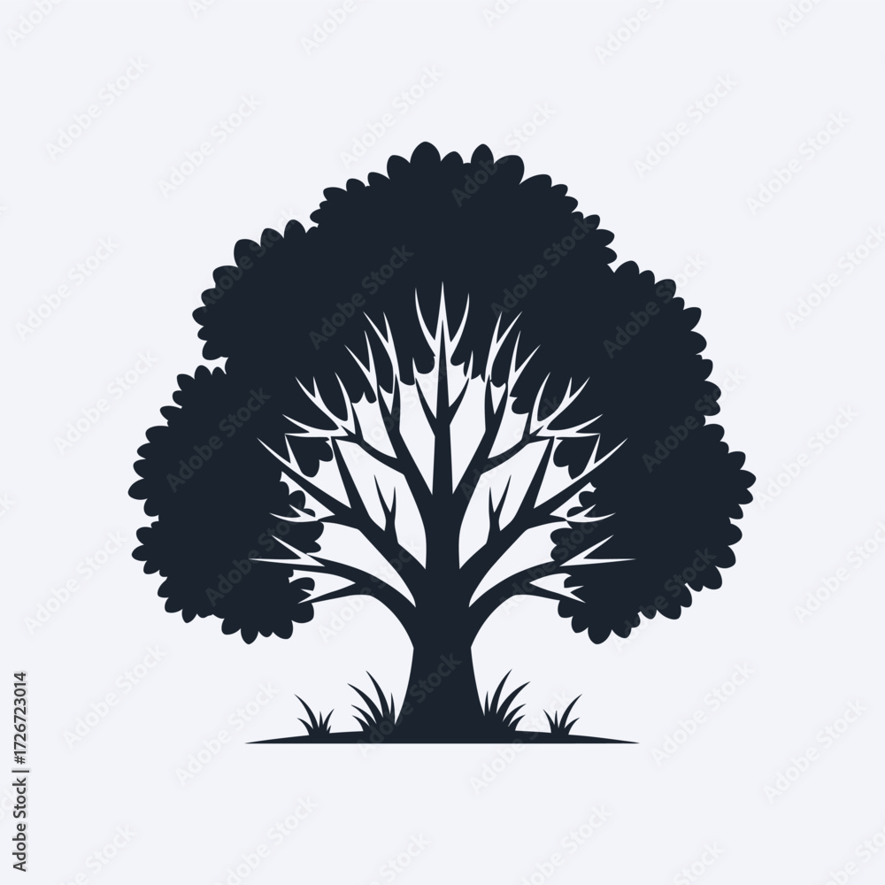 Naklejka premium Silhouetted tree with dense foliage and visible branching structure