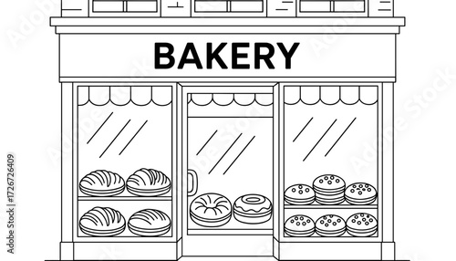 Bakery storefront with various pastries displayed in windows  