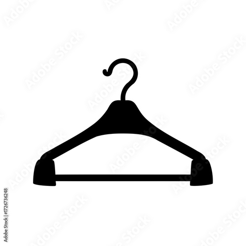 A black clothing hanger casting a strong silhouette on a white background